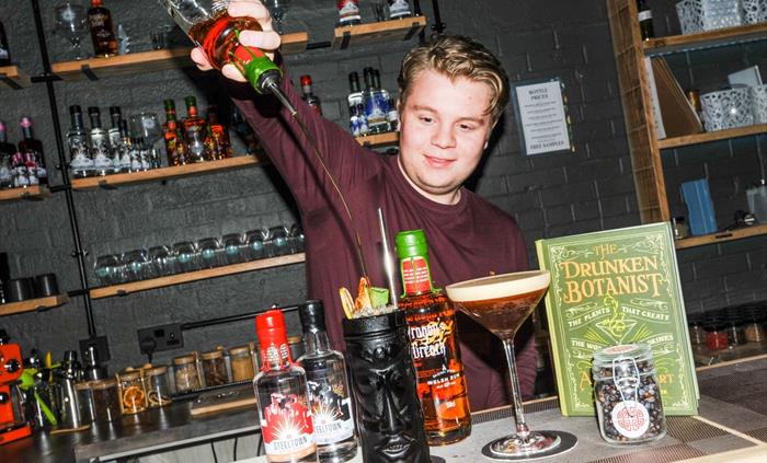 A member of the Spirit of Wales team making cocktails at a Friday Night Tasting